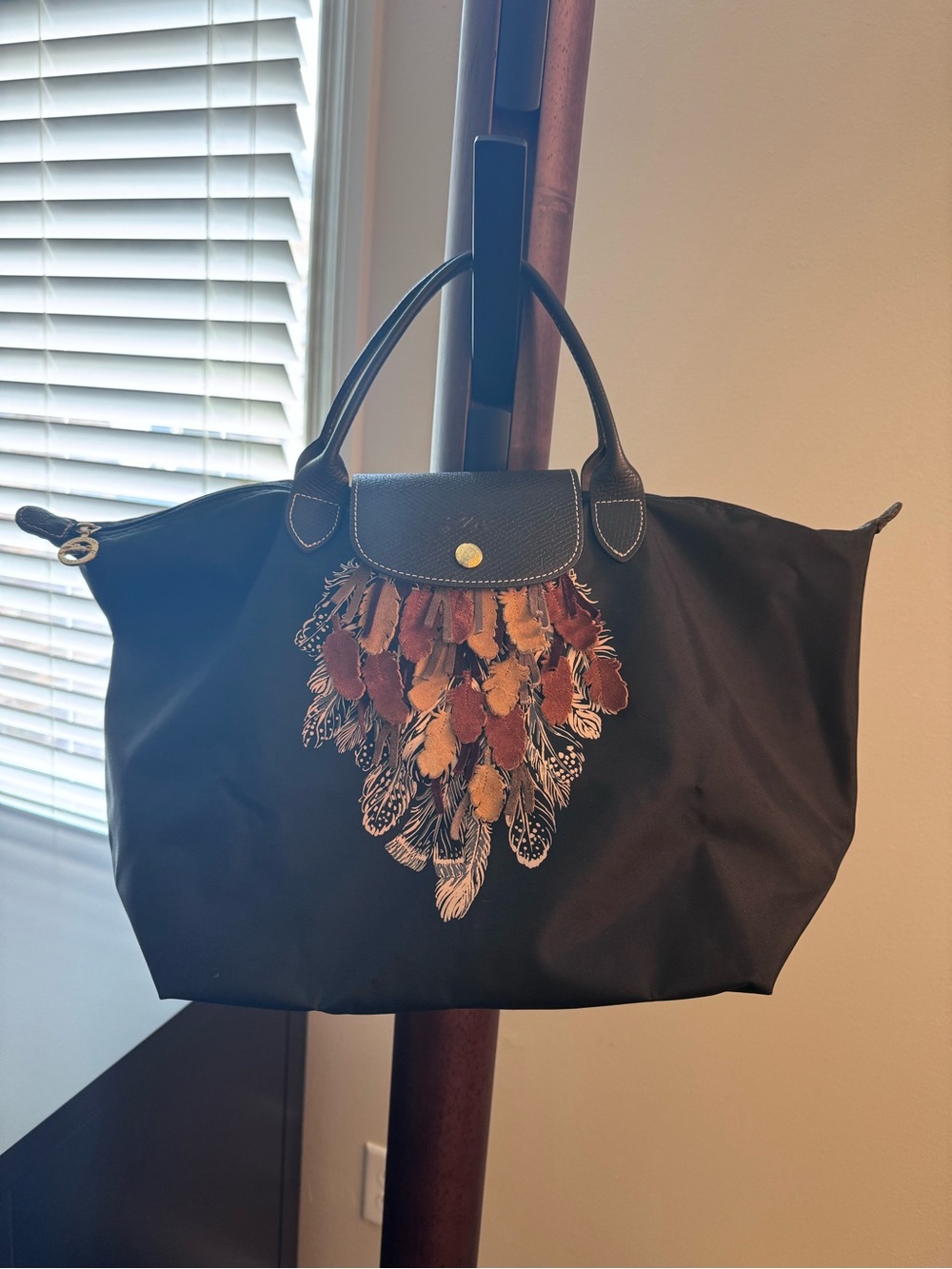 EUC Longchamp Black Tote with Multicolor Feather Motif